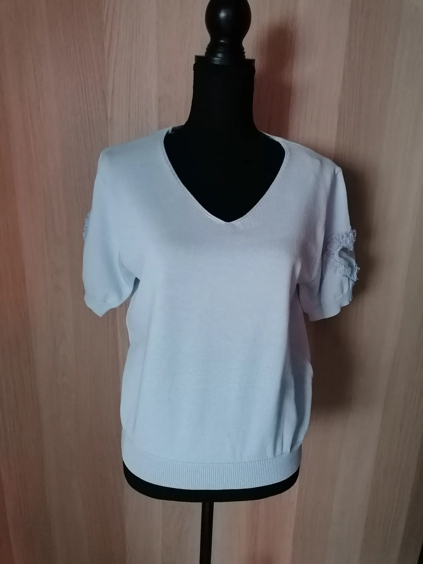 Licht blauw bloesje met hartje